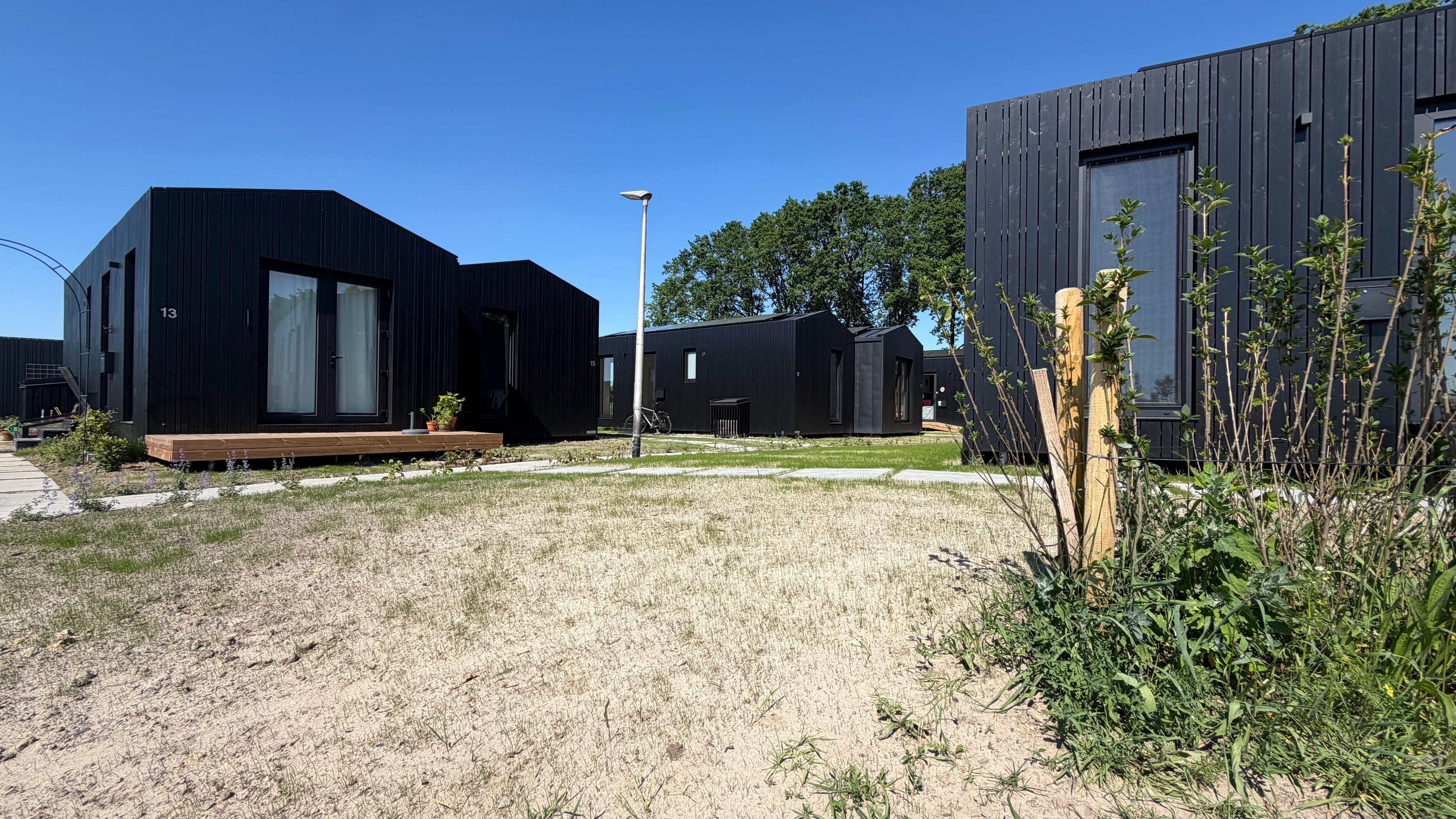 De tiny houses in Walzicht vormen een collectieve woonvorm.